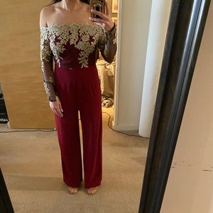 Maroon off the shoulder jumpsuit gold detail